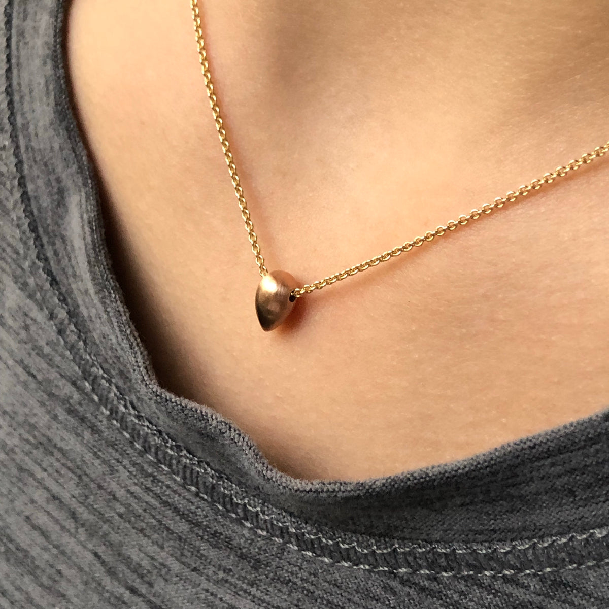 GOLD SACRED SEED NECKLACE